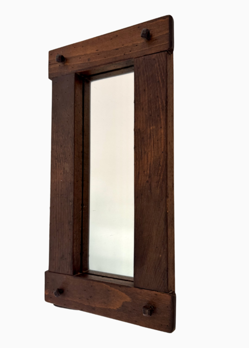 Wooden-framed mirror on a white background