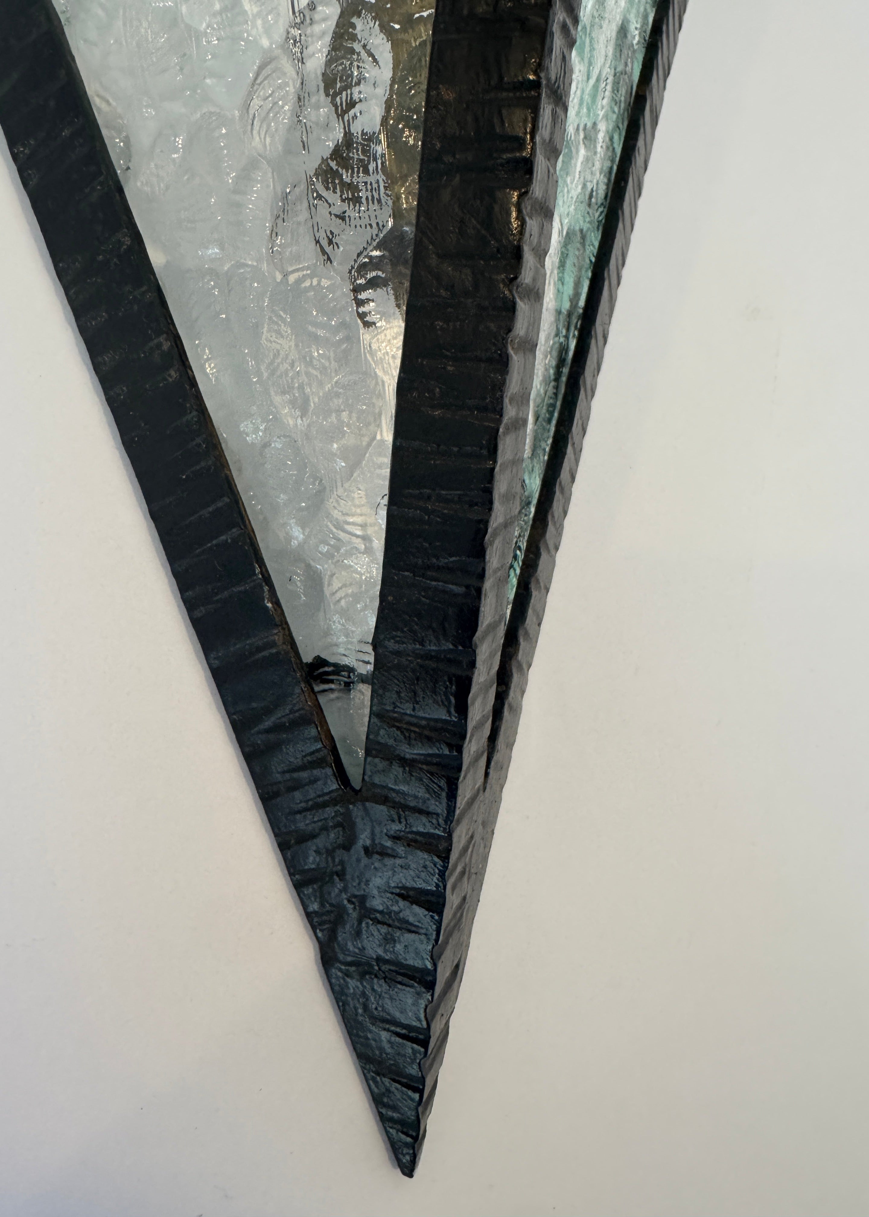 close up of black iron metal art deco wall sconces