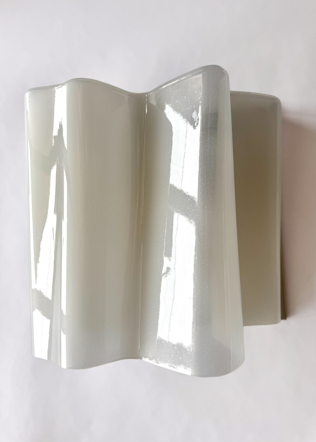 Large Artemide Logico glass wall lamp designed by Michele De Lucchi and Gerhard Reichert with overlapping sculptural glass panels.