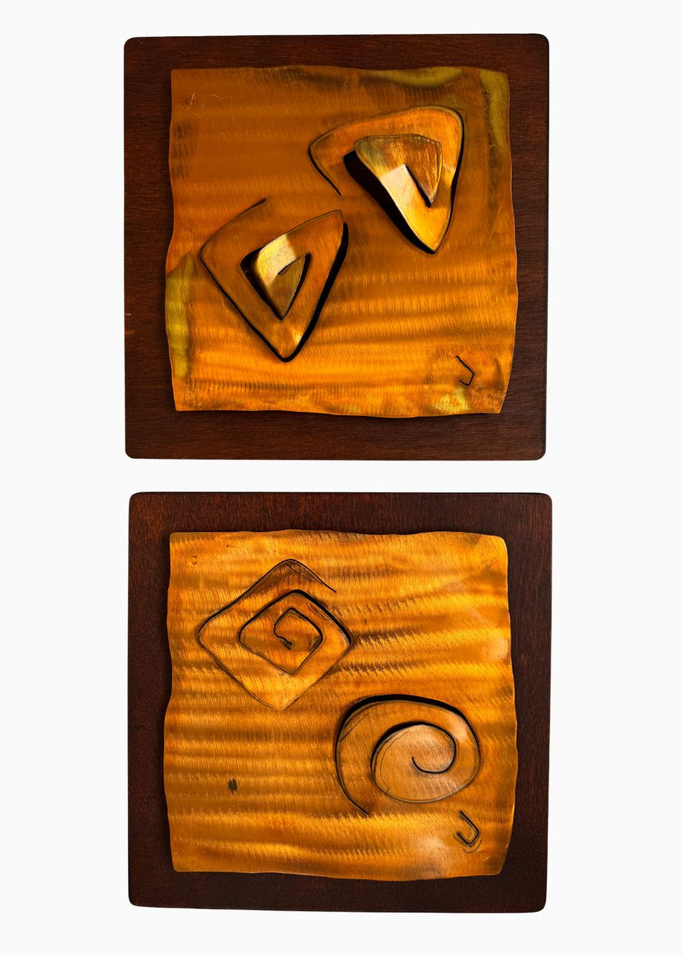 Pair of vintage hand-carved wooden wall panels with abstract organic shapes mounted on darker timber boards